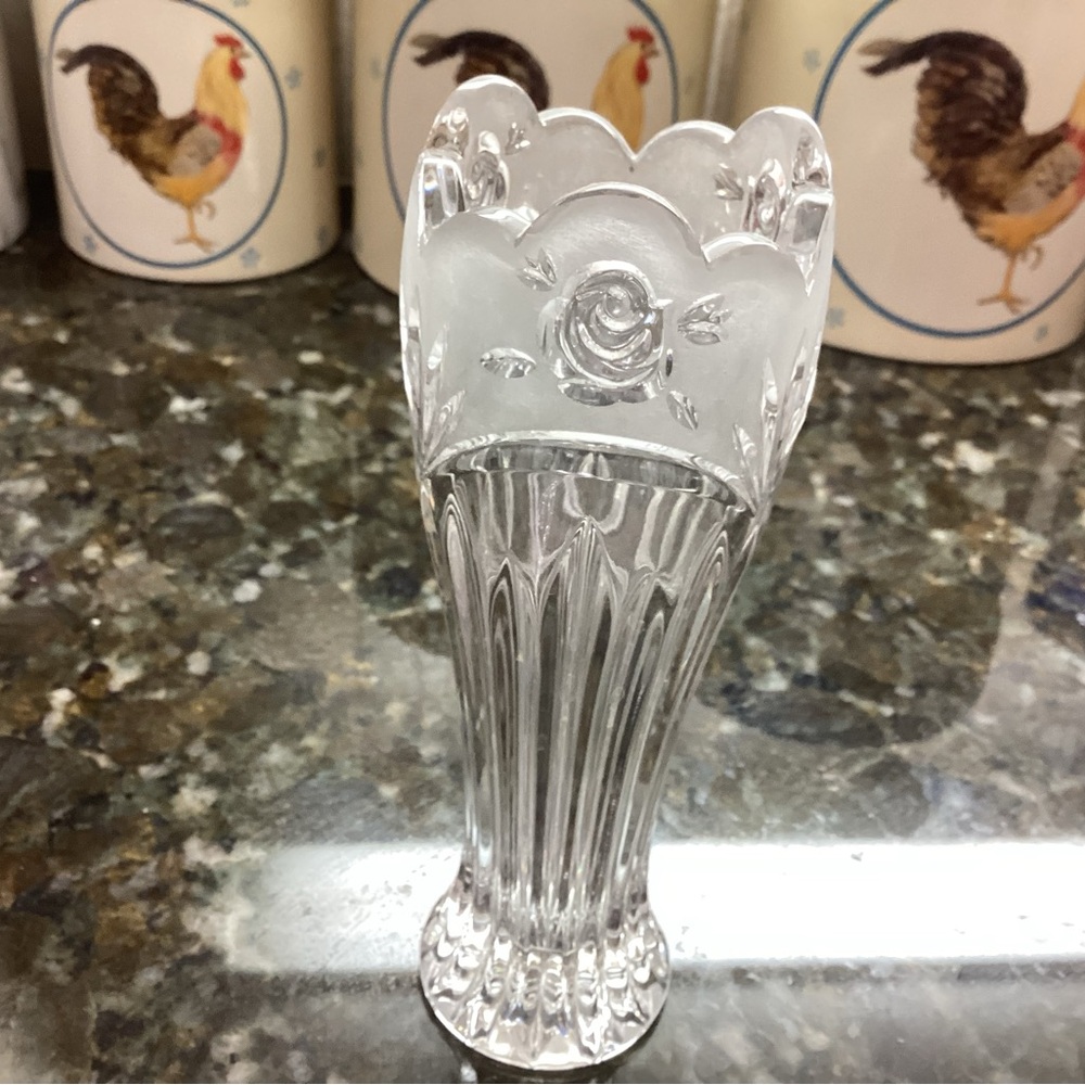 A rose crystal and frosted rosebud vase is in perfect condition.